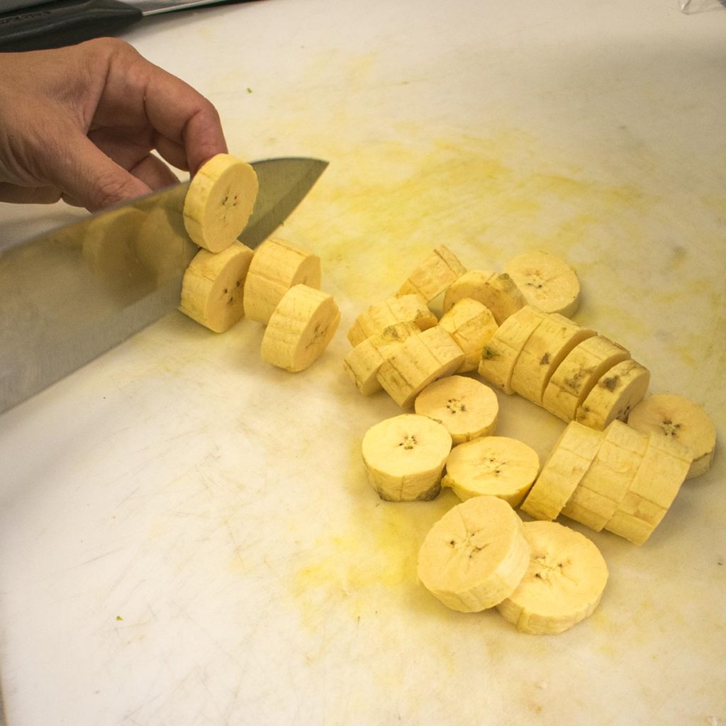 Peel the plantains and cut into 1” chunks