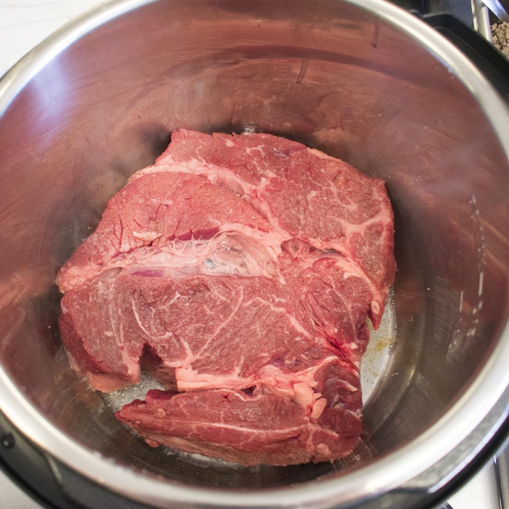 when simmering add pot roast 2-3 minutes each side