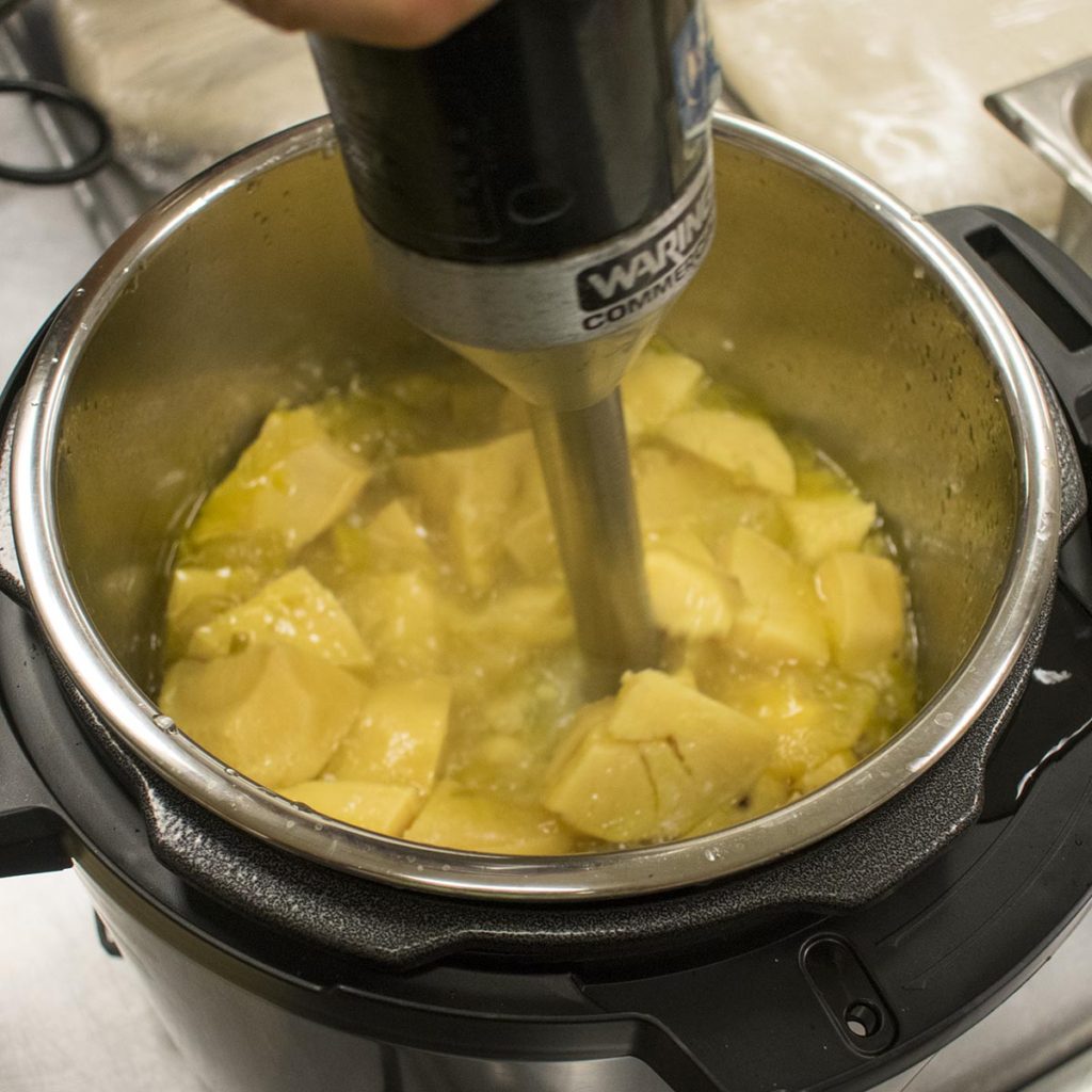 After Instant Pot depressurizes, open and puree soup