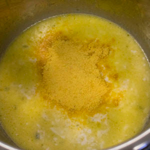 Whisk Seasoned Salt into Cream and then pour into cooking pot. Simmer until bubbly and add nutritional yeast