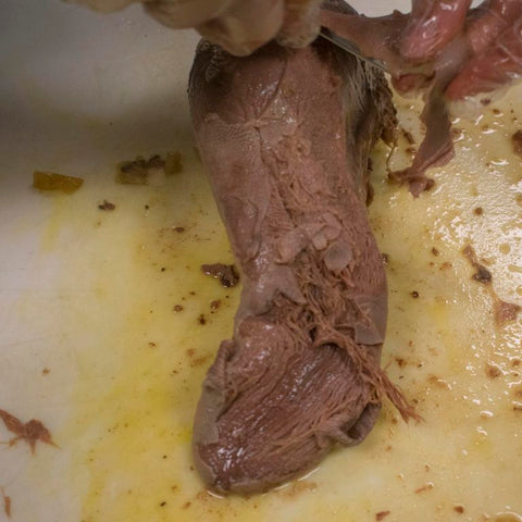 shred the lingua tongue with fork