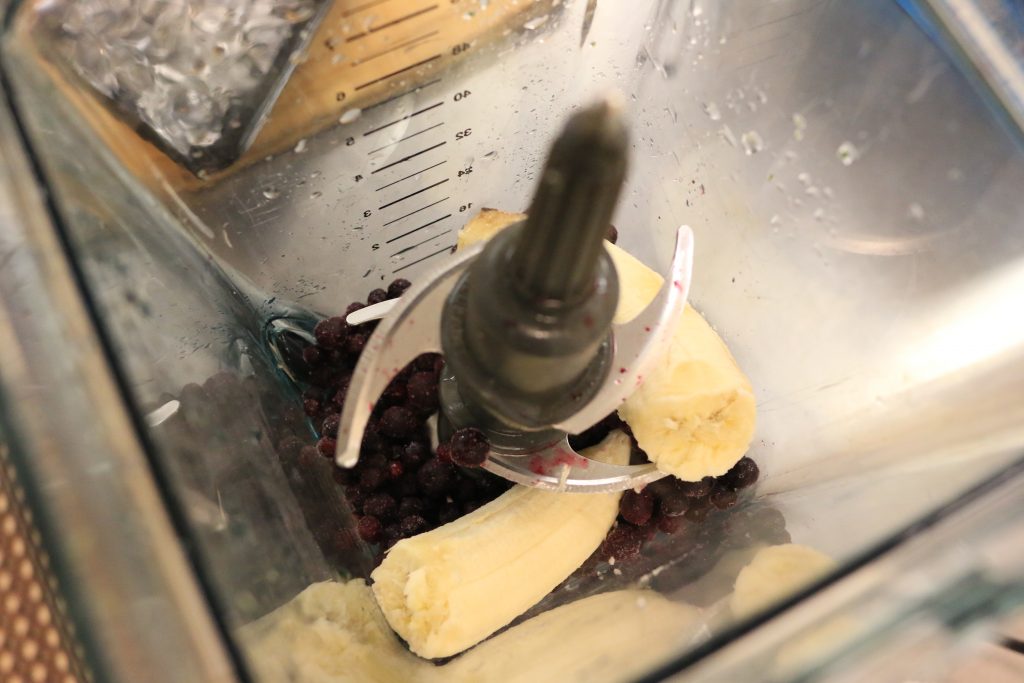 Add blueberries and banana to blender