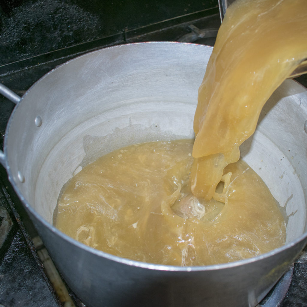 Bring the chicken stock to a simmer in a large pot