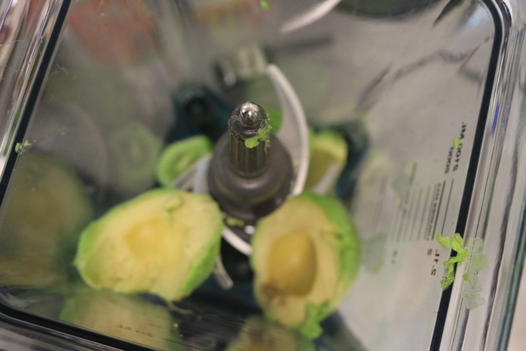 Cut avocados and add to blender