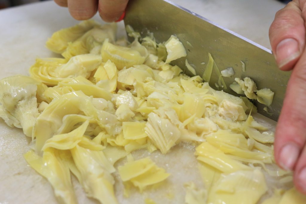 1 can artichoke hearts, packed in water, drained and chopped