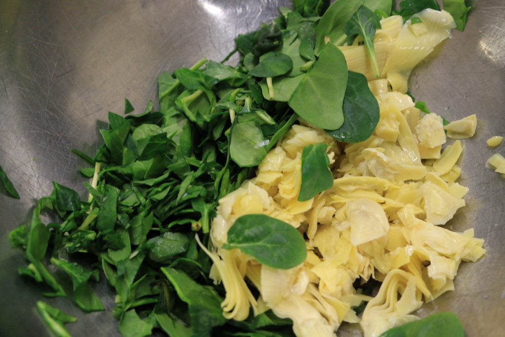 fresh baby spinach and chopped artichokes