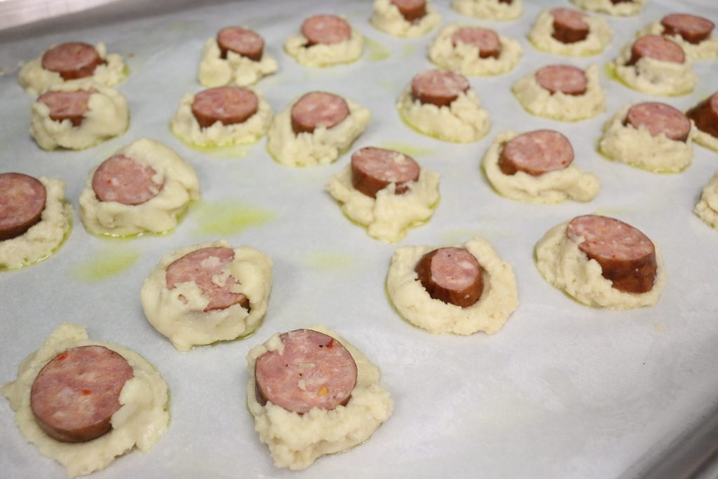 wrap the dough around a kielbasa disk