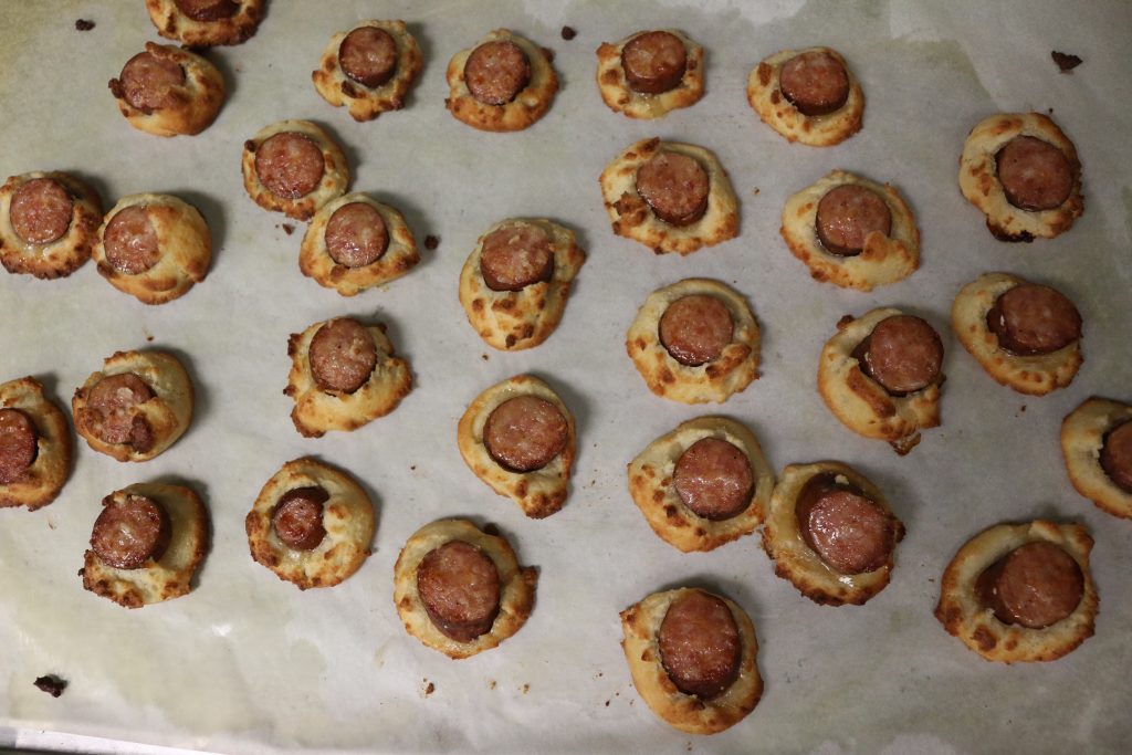 Bake Paleo Kielbasa Pigs in a Blanket at 400 until golden brown