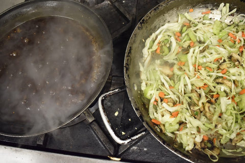 add in the mushrooms, celery, carrots and cabbage