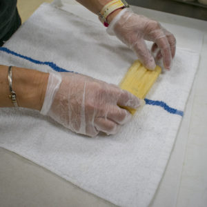fold the skinny part of the husk up over the top of the fillings to cover it