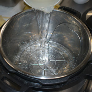 Pour Water in Instant Pot