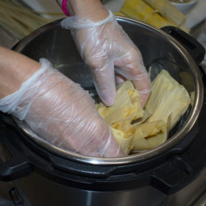 Stand the tamales up in the Instant Pot