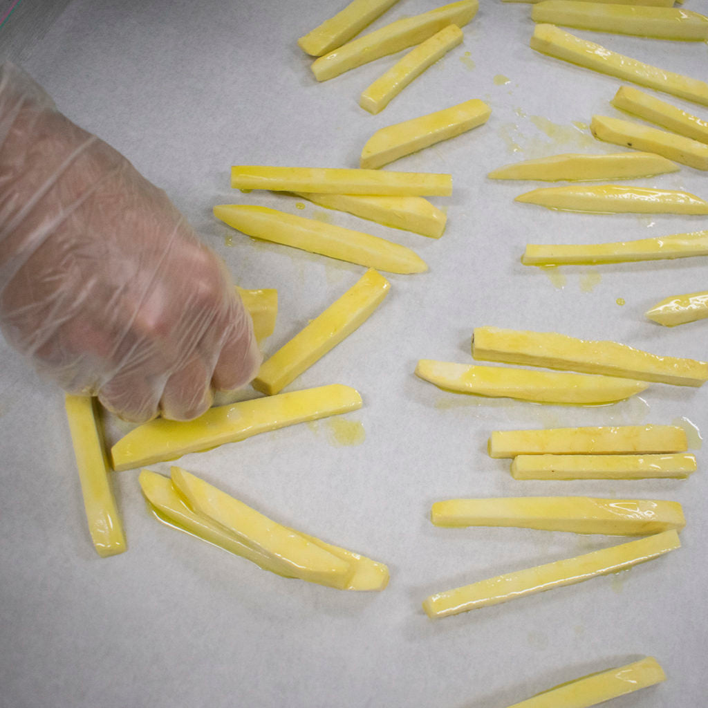 Spread the french fries out in an even layer on a sheet tray