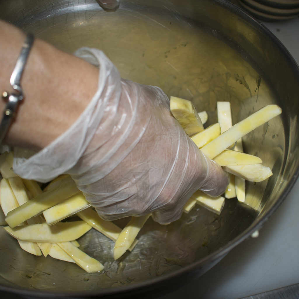 Toss french fries with olive oil