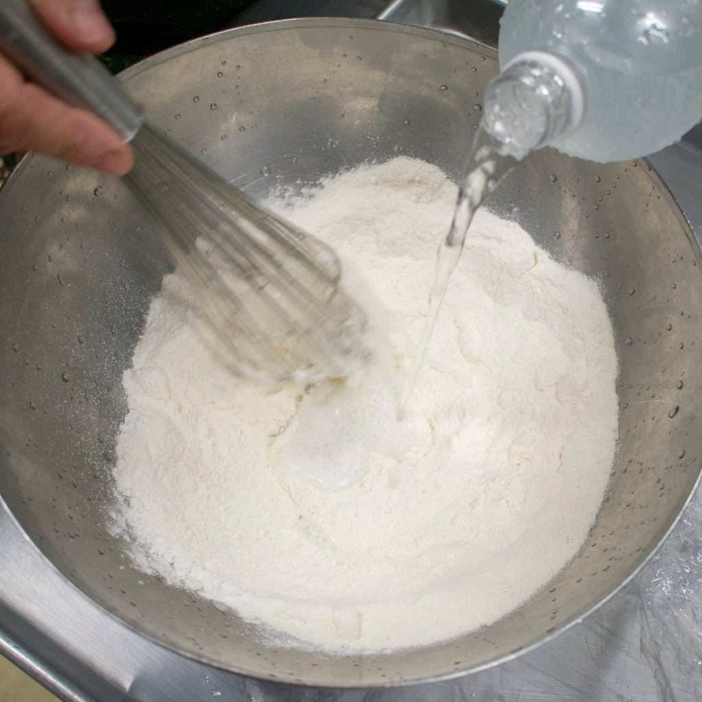 Whisk the seltzer into the flours