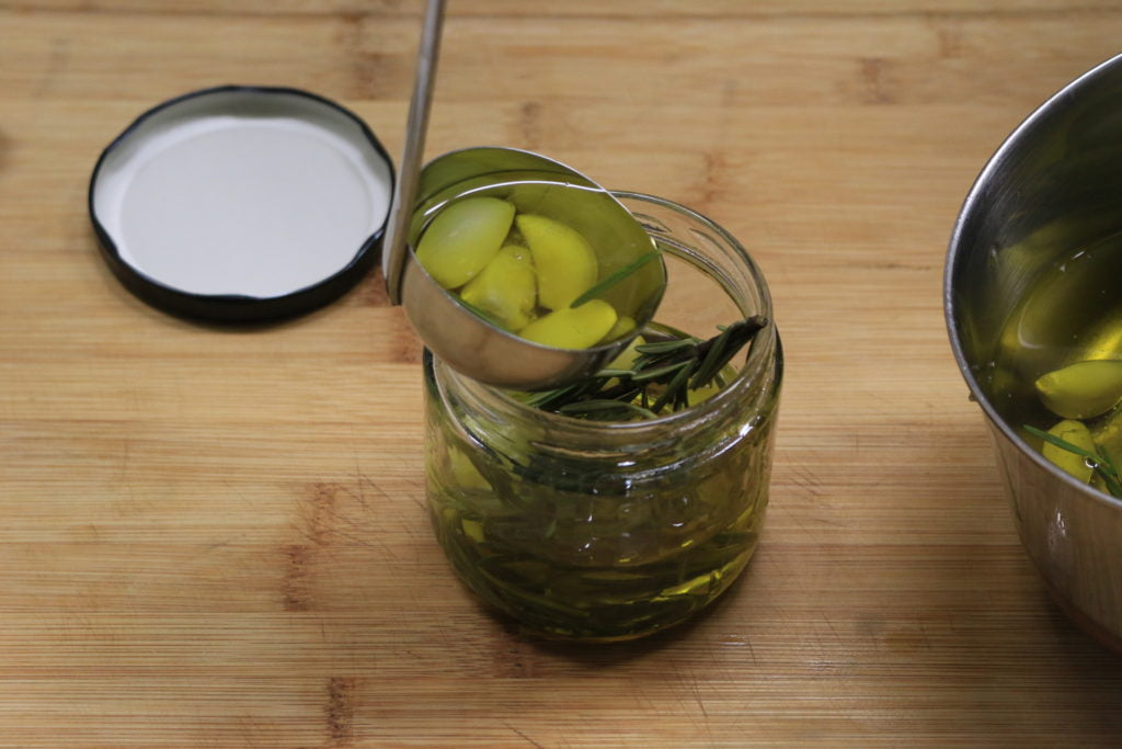 Cool rosemary garlic olive oil and jar