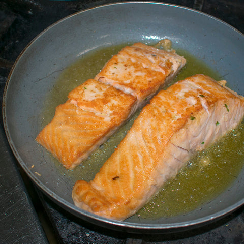 cook about 4 minutes, without moving, on the first side until golden brown on bottom then flip salmon to opposite side and place pan in 400 degree oven until salmon has cooked through, about 2 - 3 minutes longer