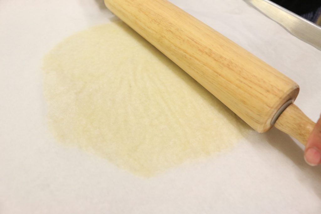 smooth the yucca dough down until it is very thin