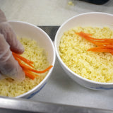 Peel and julienne the carrot and garnish
