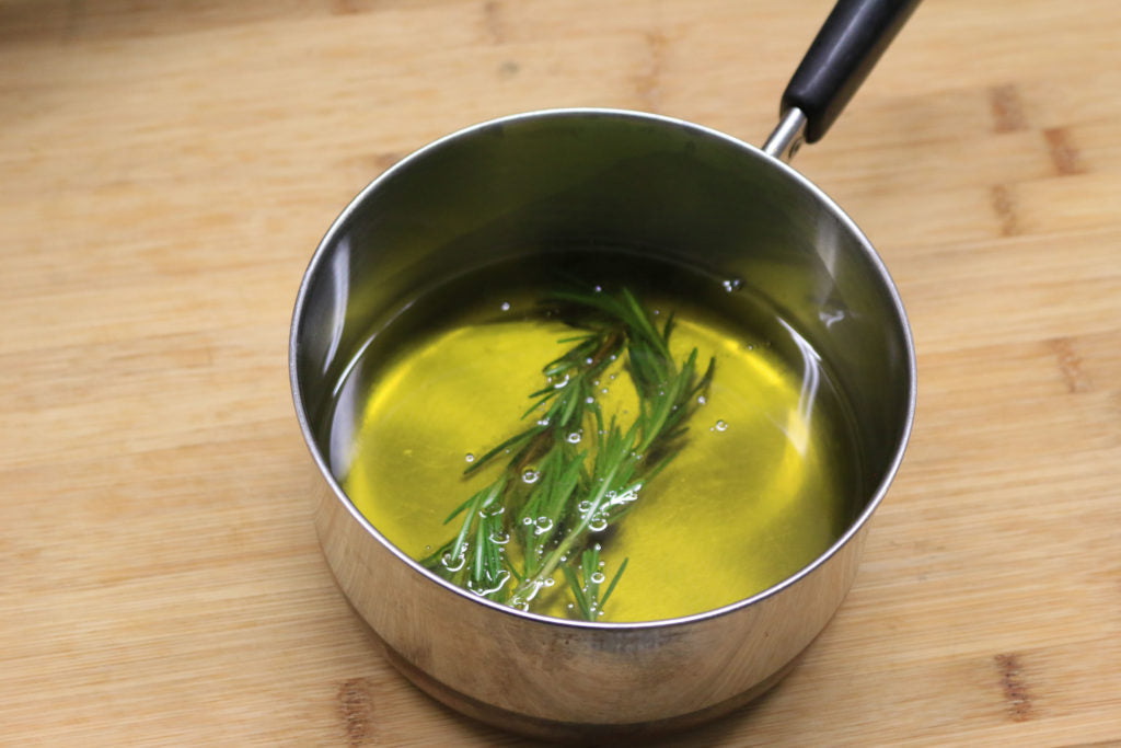 Heat oil, steep thyme and lemon peel in it for a few minutes