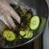 Toss with cucumbers and dress the salad with the ginger dressing