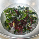 Top the Seavegi salad with the tuna poke